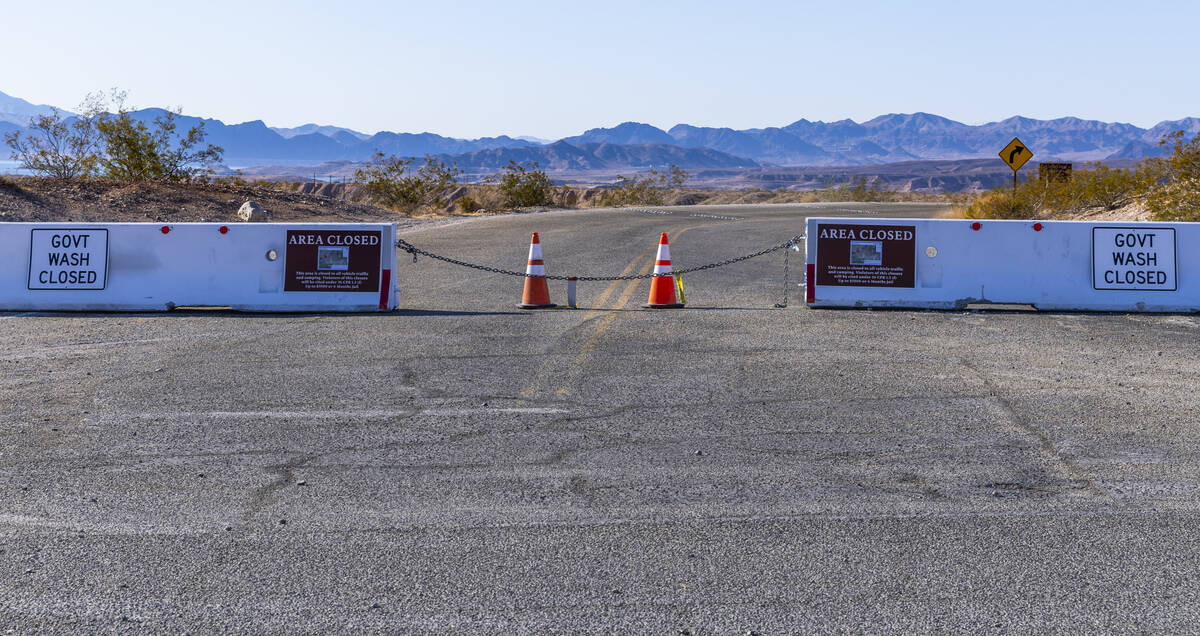 Signs denote that Government Wash is now closed on Lake Mead within the Lake Mead National Recr ...