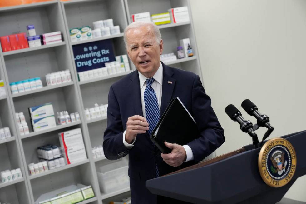 FILE - President Joe Biden leaves after speaking about prescription drug costs at the National ...