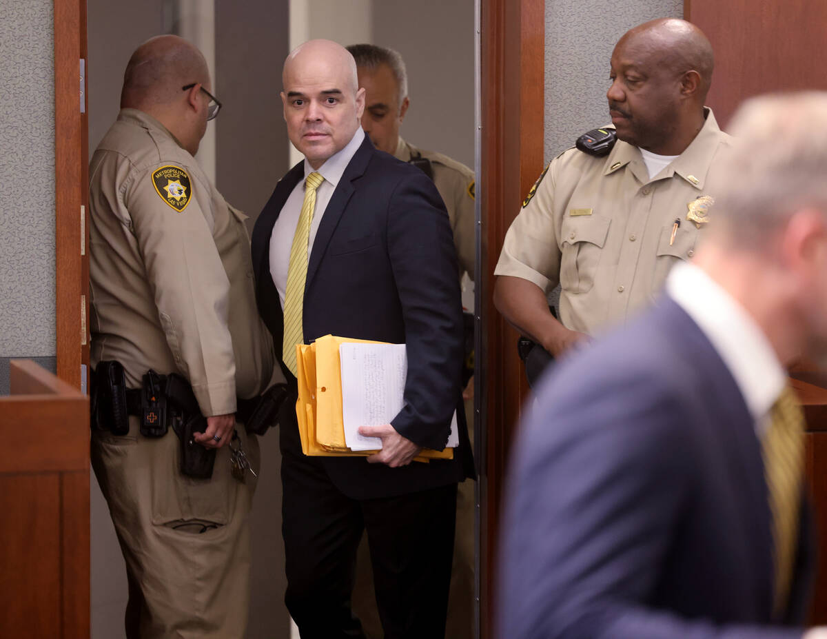 Robert Telles arrives in court on the fourth day of his murder trial at the Regional Justice Ce ...