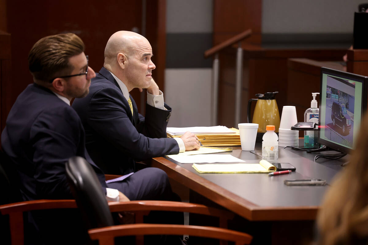 Robert Telles, right, listens to testimony in the courtroom on the fourth day of his murder tri ...