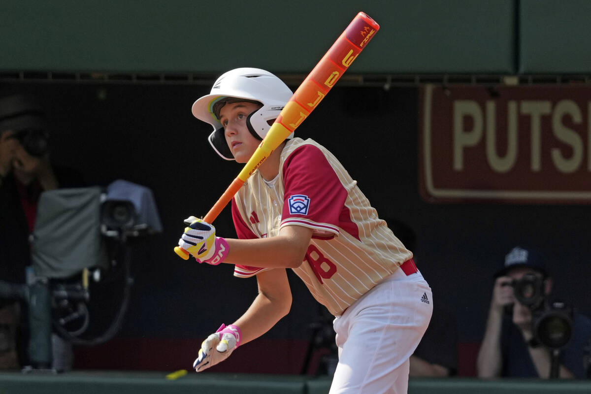 Paseo Verde's Wyatt Erickson watches his double off Staten Island, N.Y.'s Stephen Grippo during ...