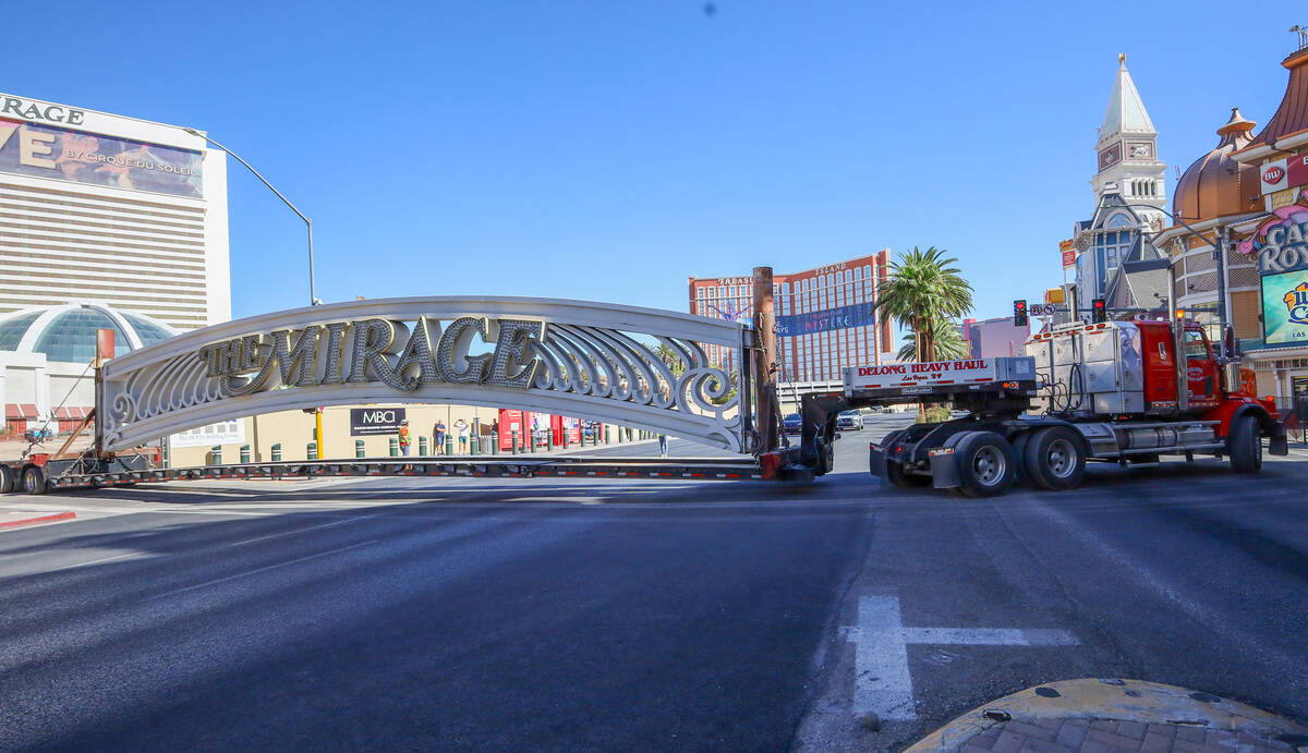 The Mirage sign that graced the entrance to the resort for 34 years is removed Wednesday, Aug. ...