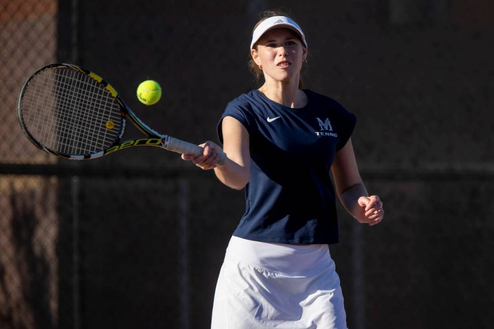 The Meadows senior Camilla Osipova competes during the tennis matches against Faith Lutheran at ...