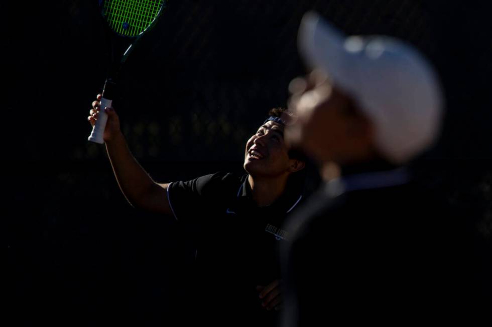 Faith Lutheran junior Samuel Gastaldo looks for the ball during the tennis matches against The ...