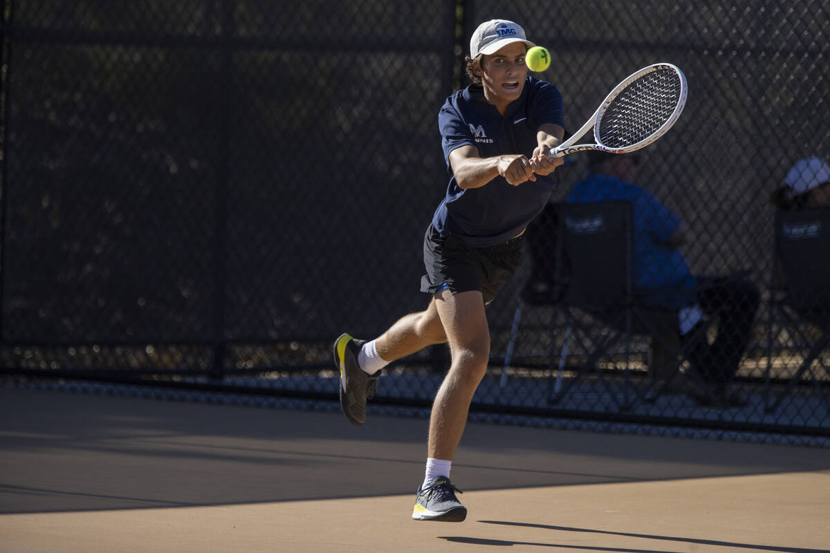 The Meadows freshman Jacob Garber competes during the tennis matches against Faith Lutheran at ...