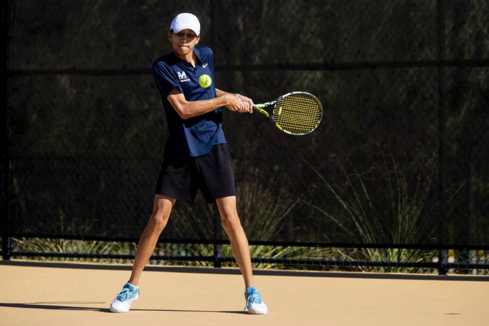 The Meadows junior Steven Tian competes during the tennis matches against Faith Lutheran at Fai ...