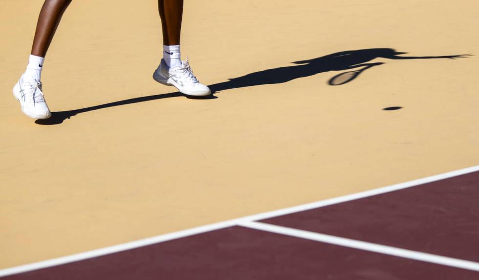 Faith Lutheran senior Taryn Toomer competes during the tennis matches against The Meadows at Fa ...