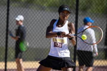 Faith Lutheran senior Taryn Toomer competes during the tennis matches against The Meadows at Fa ...