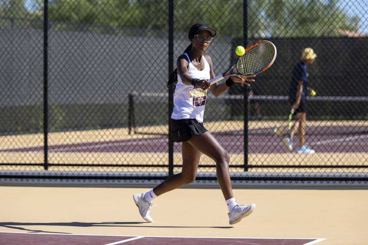 Faith Lutheran senior Taryn Toomer competes during the tennis matches against The Meadows at Fa ...