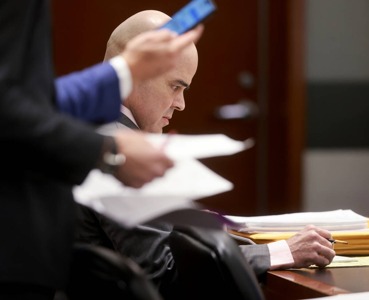 Robert Telles takes notes in court during a break in testimony on the fifth day of his murder t ...