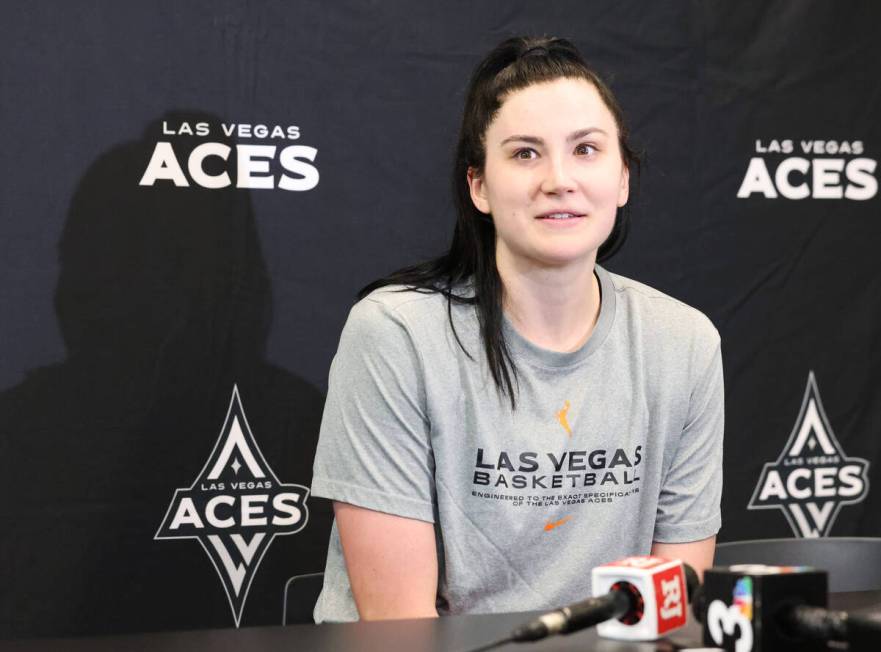 Las Vegas Aces center Megan Gustafson listens to a question during a news conference following ...