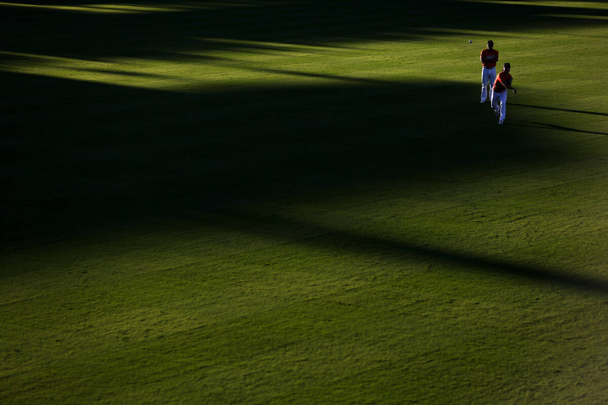 The Las Vegas Aviators warm up before a Minor League Baseball game against the Oklahoma City Ba ...