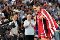 United States' Kelsey Plum (5) celebrates after a women's gold medal basketball game at Bercy A ...