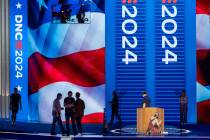 Workers prepare for next week's Democratic National Convention at the United Center in Chicago, ...