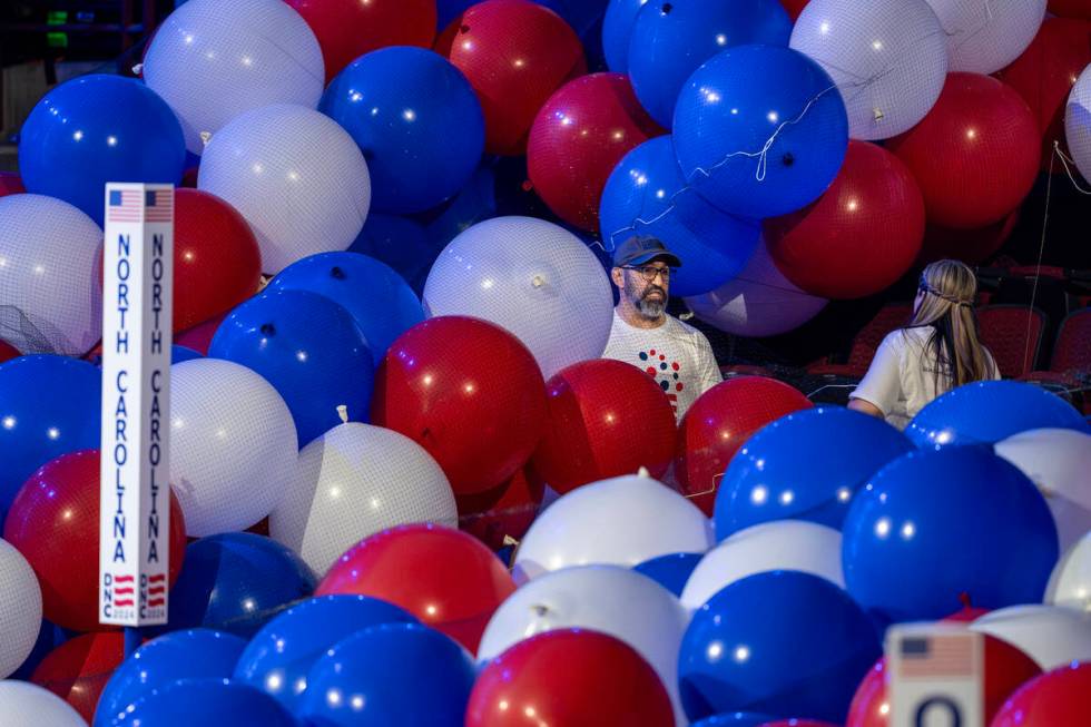 Workers prepare for next week's Democratic National Convention at the United Center in Chicago, ...