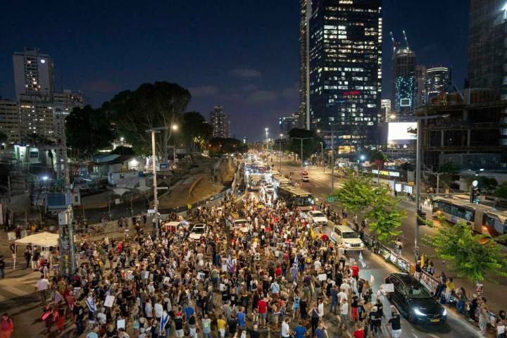 Relatives of hostages held by Hamas in the Gaza Strip and their supporters protest in Tel Aviv, ...