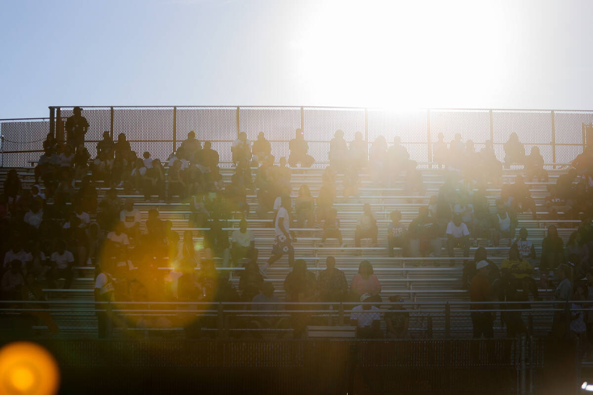 Legacy’s home crowd is shaded from the sun during a football game between Legacy and Bas ...