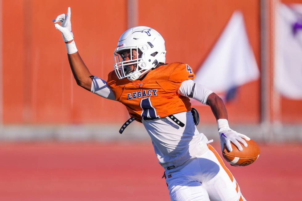 Legacy cornerback/wide receiver Jayden Bridgewater (4) celebrates a touchdown during a football ...