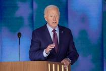 President Joe Biden checks out the stage before the Democratic National Convention Monday, Aug. ...