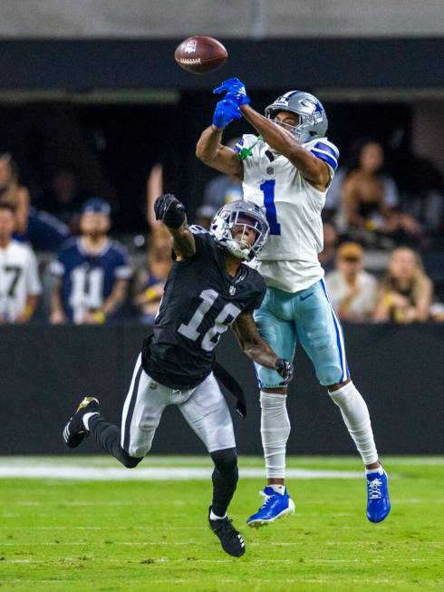 Raiders cornerback Jack Jones (18) breaks up a pass to Dallas Cowboys wide receiver Jalen Tolbe ...