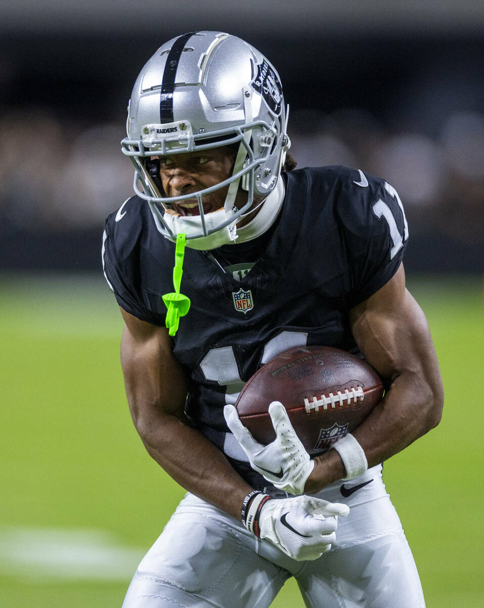 Raiders wide receiver Tre Tucker (11) celebrates a long pass catch over Dallas Cowboys cornerba ...