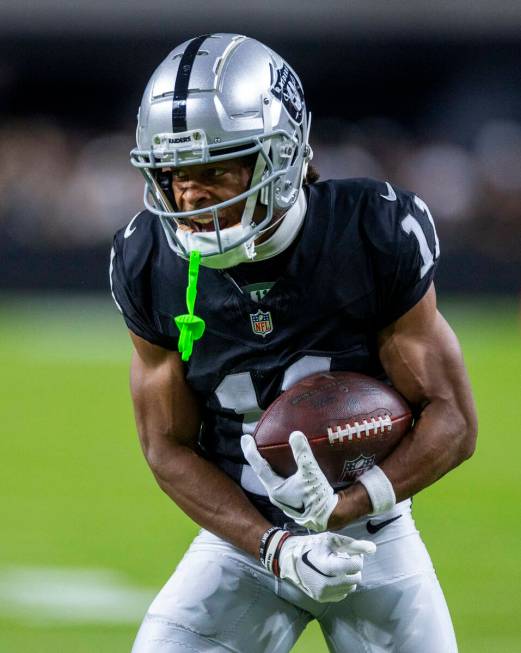 Raiders wide receiver Tre Tucker (11) celebrates a long pass catch over Dallas Cowboys cornerba ...