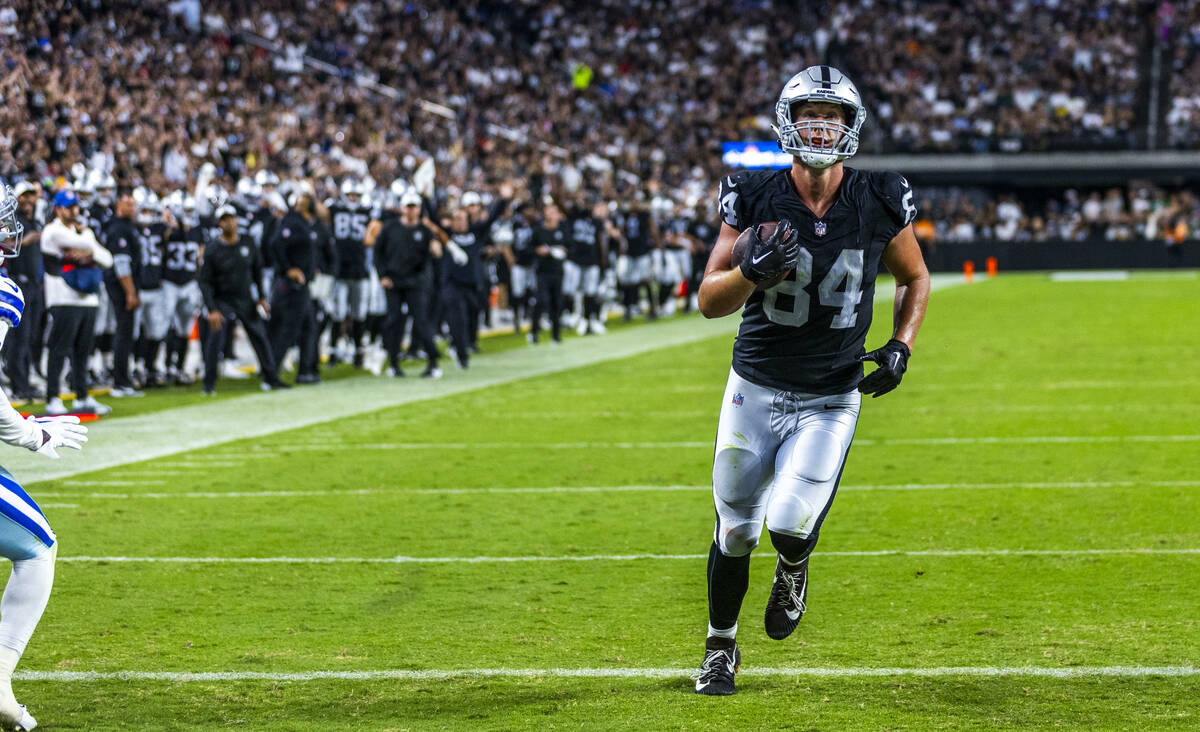 Raiders tight end Harrison Bryant (84) scores untouched after a reception against the Dallas Co ...