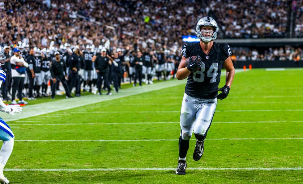 Raiders tight end Harrison Bryant (84) scores untouched after a reception against the Dallas Co ...