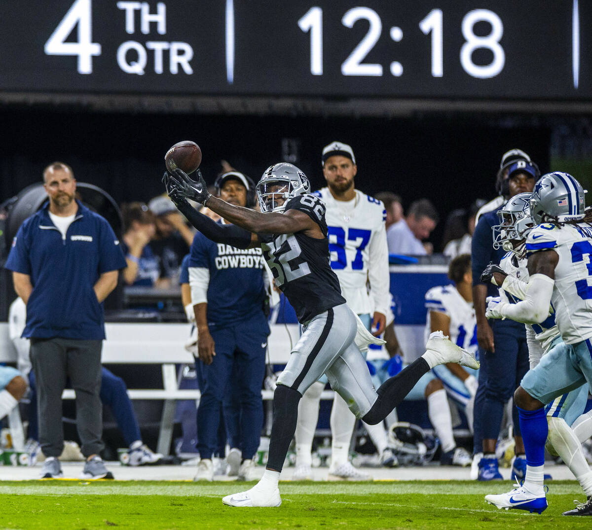 Raiders wide receiver Ramel Keyton (82) gets his fingers on a long pass against the Dallas Cowb ...