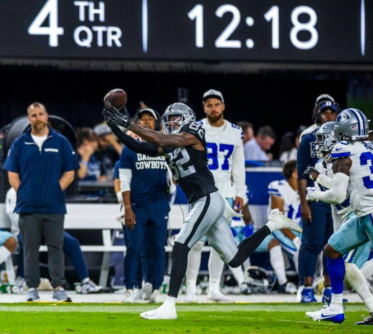 Raiders wide receiver Ramel Keyton (82) gets his fingers on a long pass against the Dallas Cowb ...