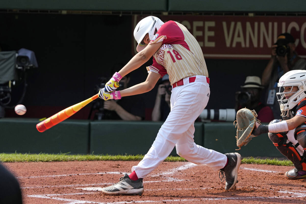 Henderson, Nev.'s Wyatt Erickson hits a two-run double off Staten Island, N.Y.'s Stephen Grippo ...