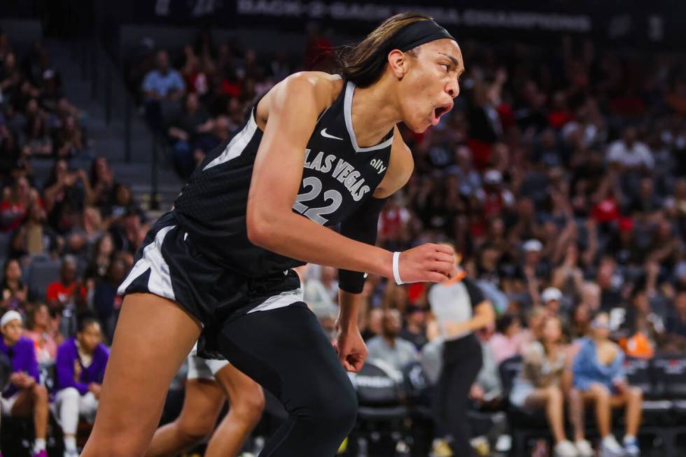 Aces center A'ja Wilson (22) gets amped up during a WNBA basketball game between the Aces and t ...