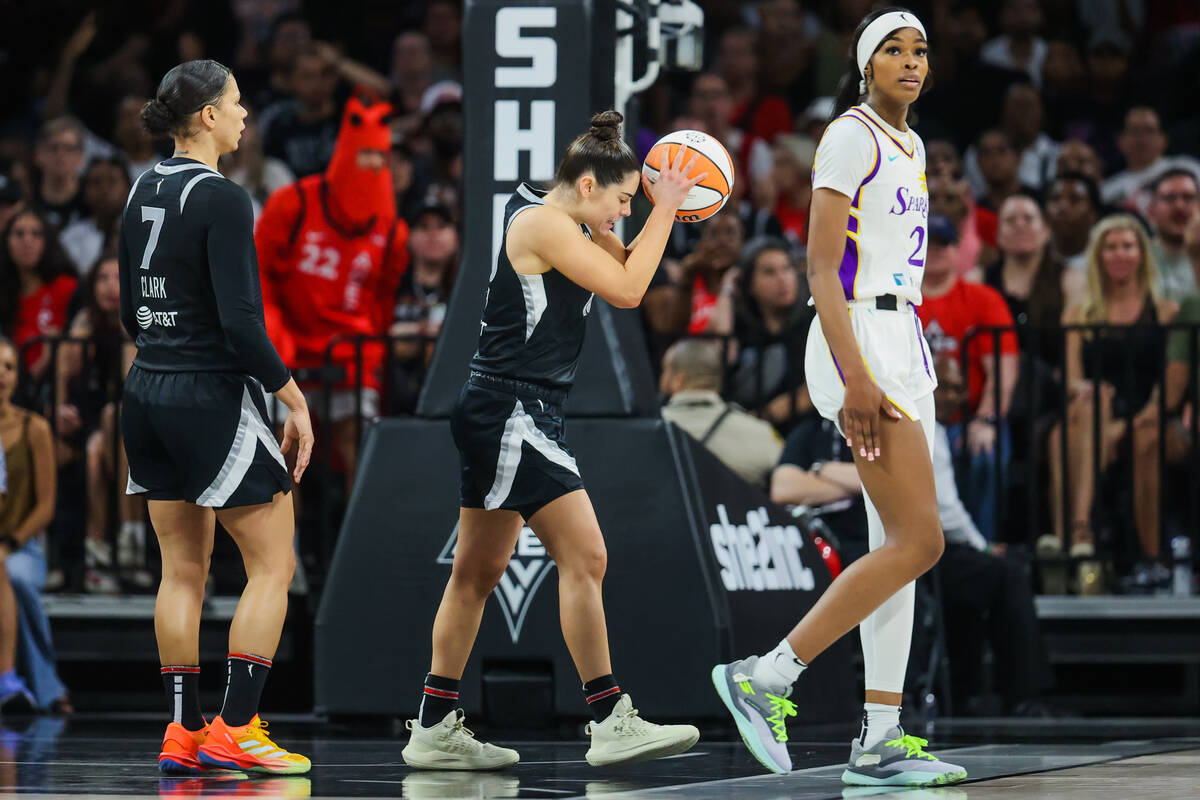 Aces guard Kelsey Plum (10) reacts to a referee calling a foul during a WNBA basketball game be ...