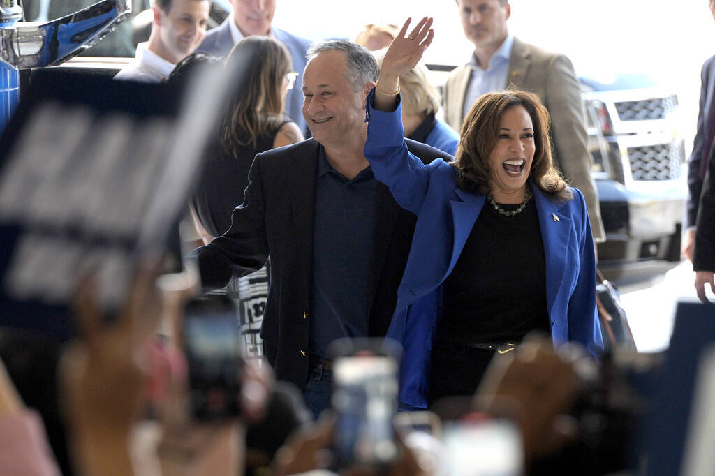 Democratic presidential nominee Vice President Kamala Harris, right, and second gentleman Doug ...