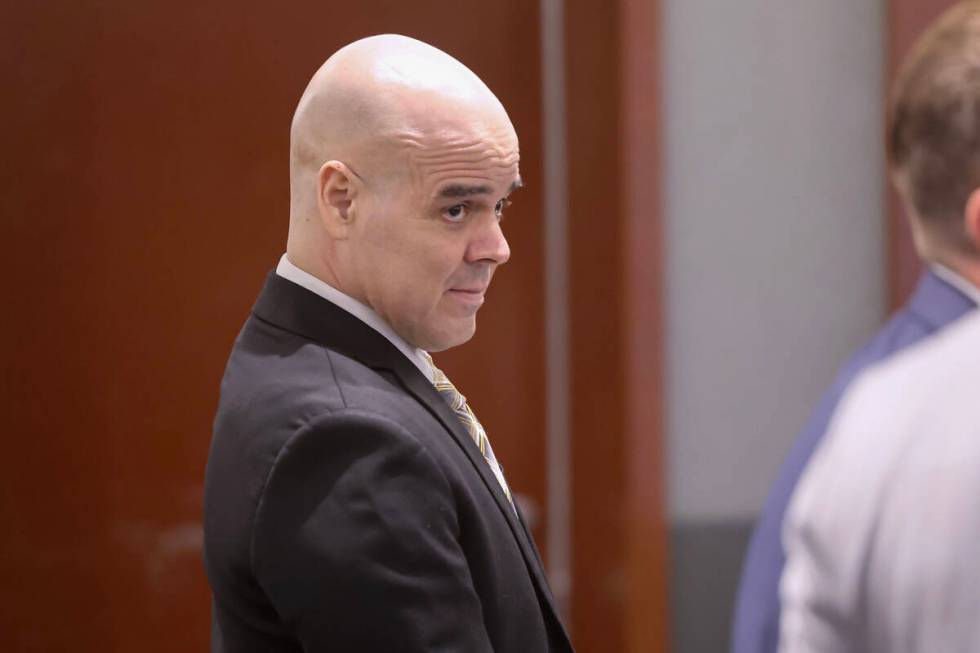 Robert Telles stands as the jury enters the courtroom at the start of the sixth day of his murd ...