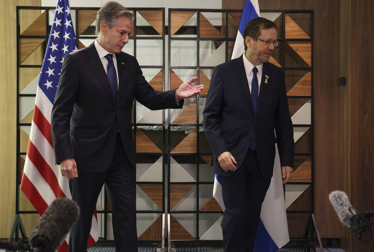 U.S. Secretary of State Antony Blinken, left, meets with Israel's President Isaac Herzog, in Te ...