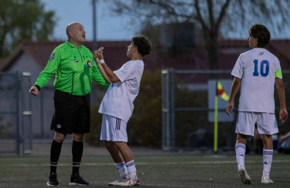 Sierra Vista midfielder Edwin Cruz (11) pleads his case to the referee during the high school s ...