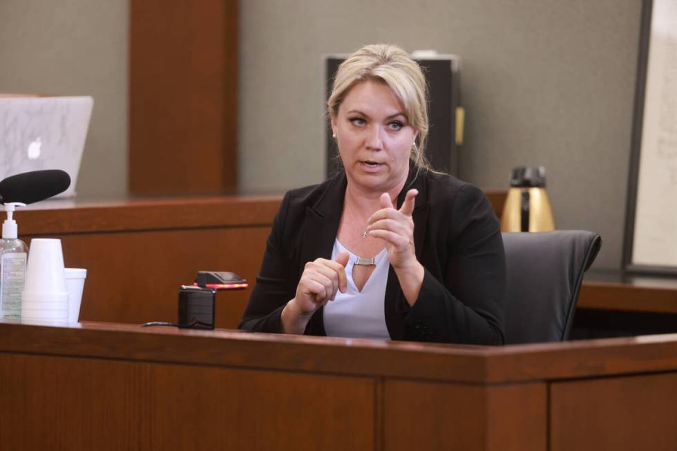 Las Vegas police Detective Justine Gatus testifies on the witness stand during the murder trial ...