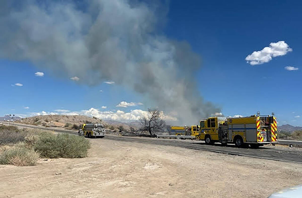 Smoke rises over a 63-acre brush fire between Laughlin and Bullhead City, Arizona, on Monday, , ...