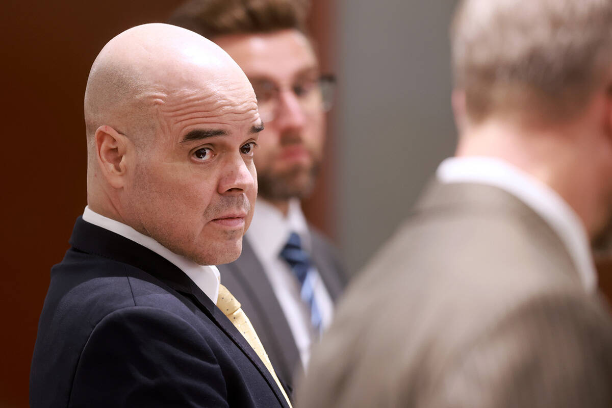 Robert Telles, left, listens to one of his attorneys Robert Draskovich in court on the seventh ...