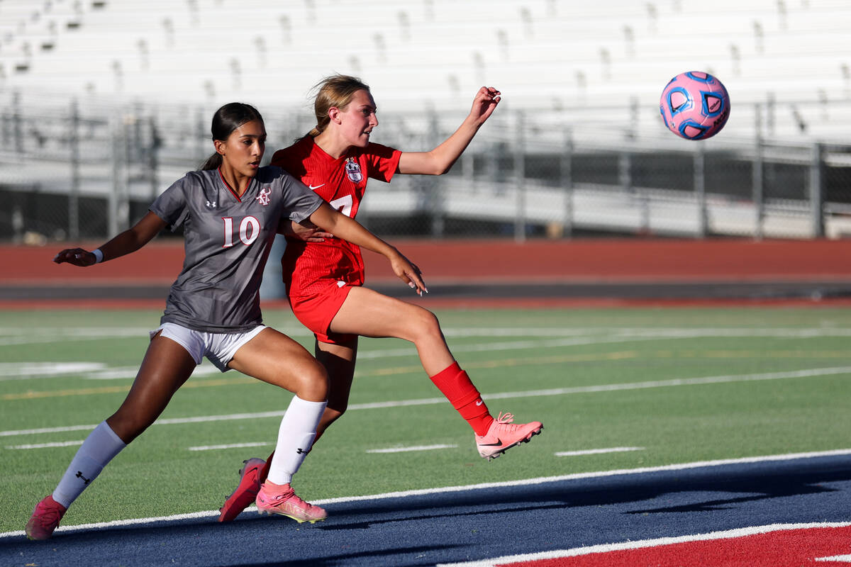 Arbor View defender Natalie Simon (10) works against Coronado forward Jordyn Gogna while she at ...