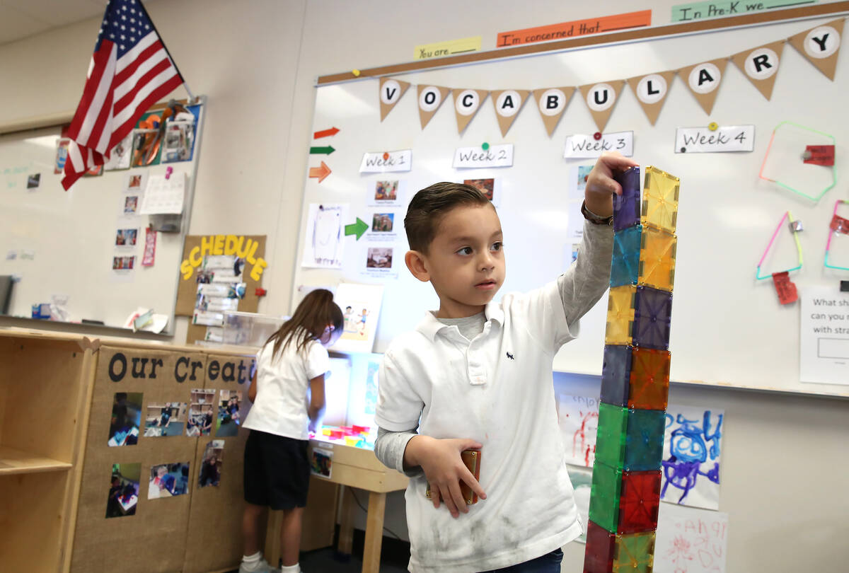 Pre-kindergarten student, Edward Cardenas Castro, 5, plays with magnetic tiles at McCaw STEAM A ...