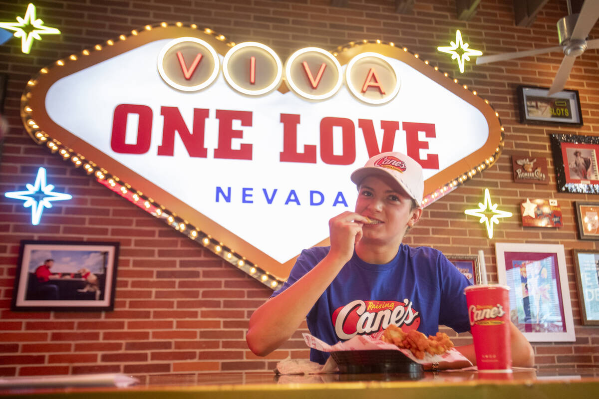 Olympic medalist Katie Grimes eats a chicken finger during a promotional homecoming “shi ...