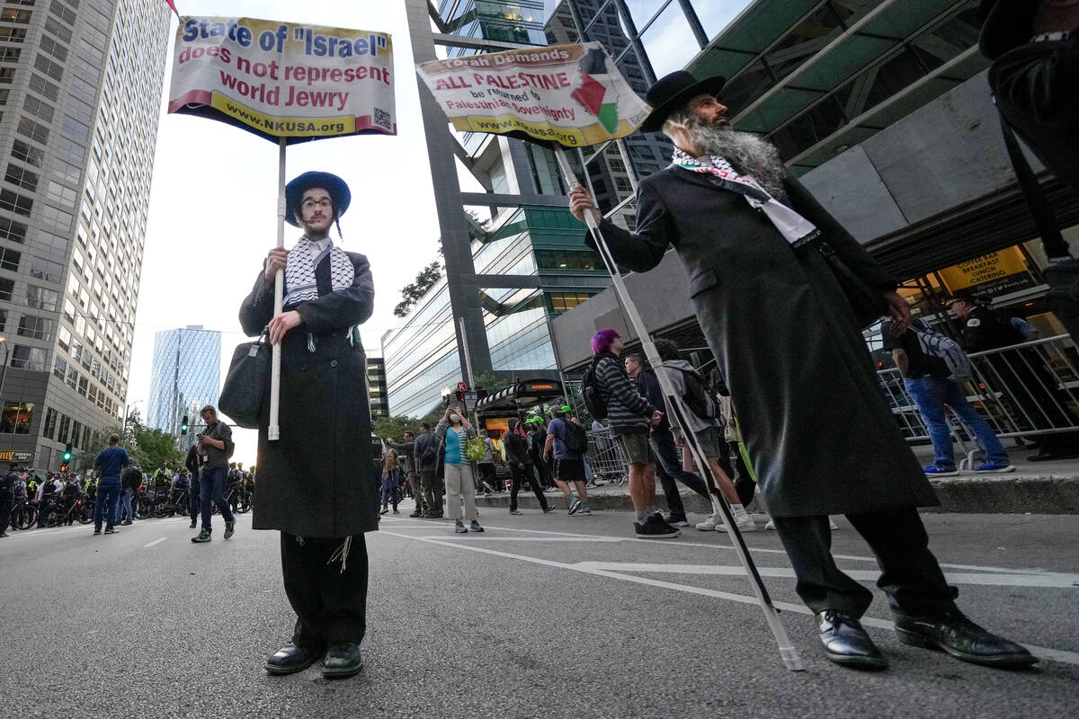 Protesters demonstrate near the Israeli Consulate during the Democratic National Convention Tue ...