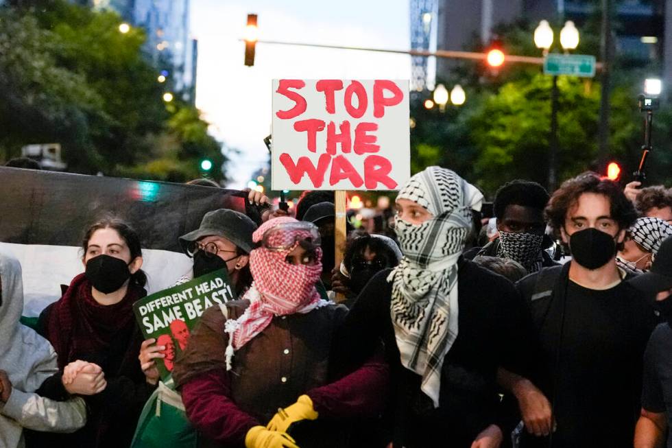 Protesters demonstrate near the Israeli Consulate during the Democratic National Convention Tue ...