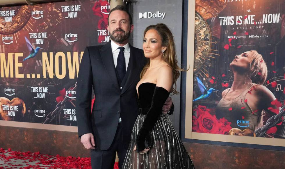 Ben Affleck, left, and Jennifer Lopez arrive at the premiere of "This Is Me... Now: A Love Stor ...