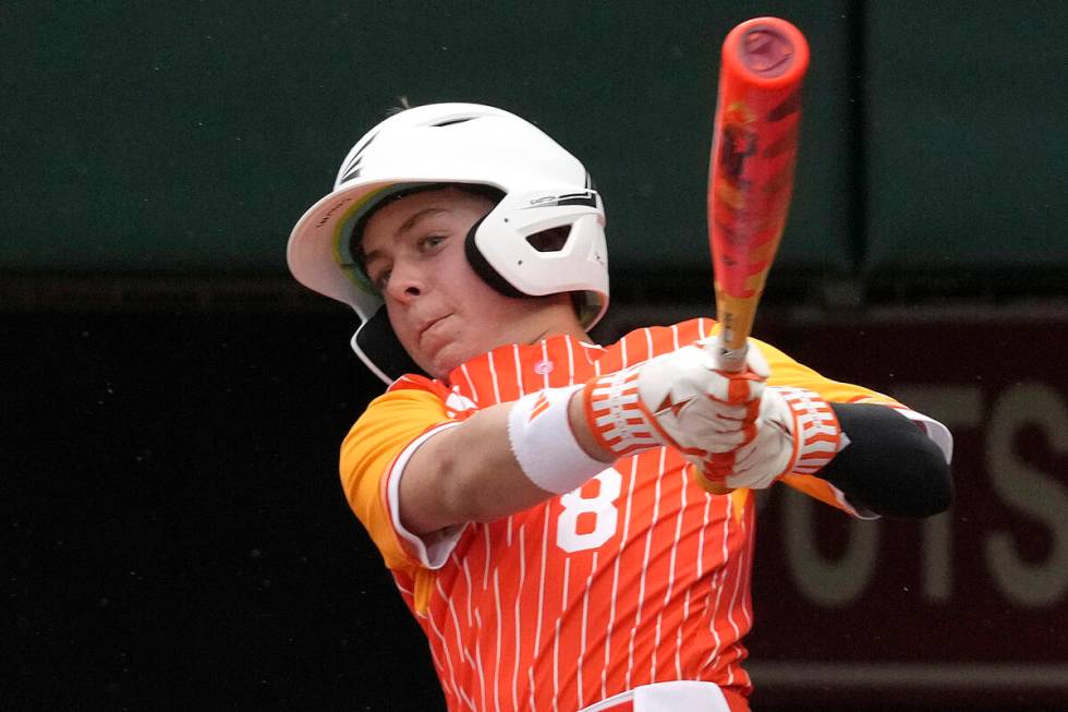 Boerne, Texas' Gray Collins (8) hits a double off Henderson, Nev.'s Wyatt Erickson, driving in ...