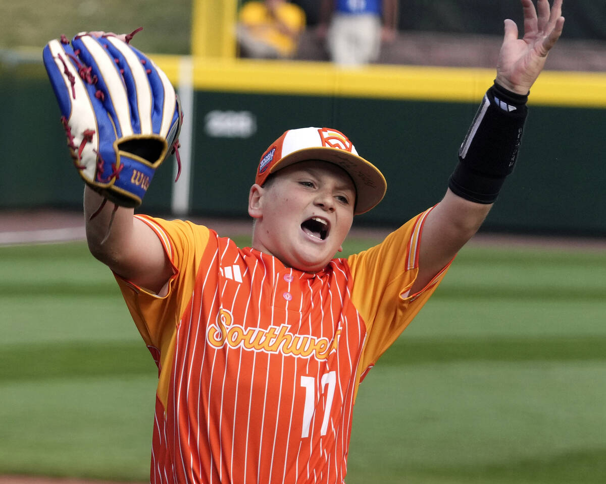 Boerne, Texas' Cooper Hastings (17) celebrates after getting the final out of a baseball game a ...