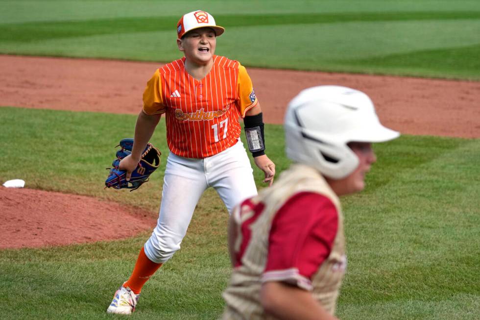 Boerne, Texas' Cooper Hastings (17) begins to celebrate after getting Henderson, Nev.'s Oliver ...