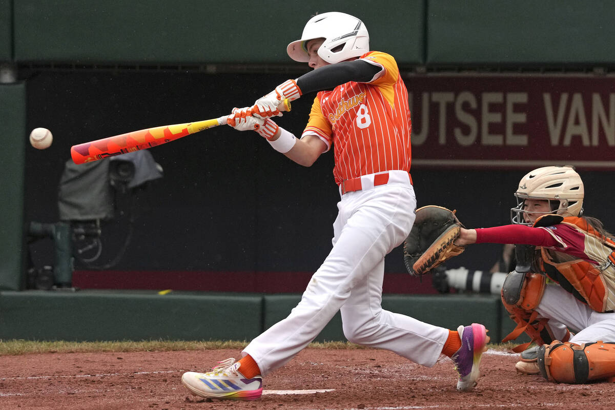 Boerne, Texas' Gray Collins (8) hits a double off Henderson, Nev.'s Wyatt Erickson, driving in ...